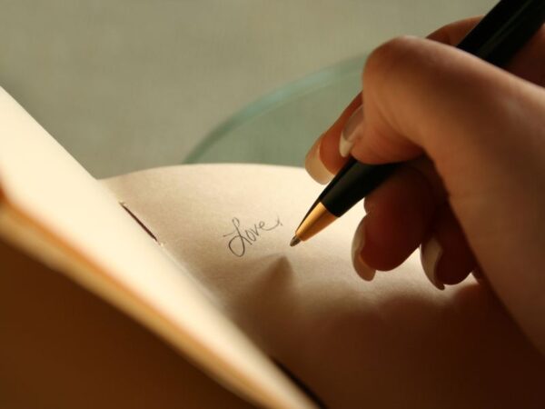 Mindful journaling workshop at My Healing Suite, National Harbor, MD—writing “Love” for self-reflection and healing